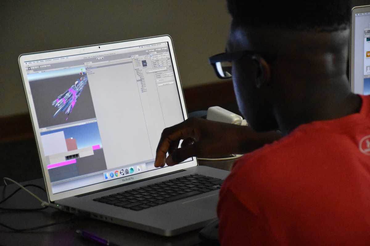 Students making games at intro to video game creation summercamp
