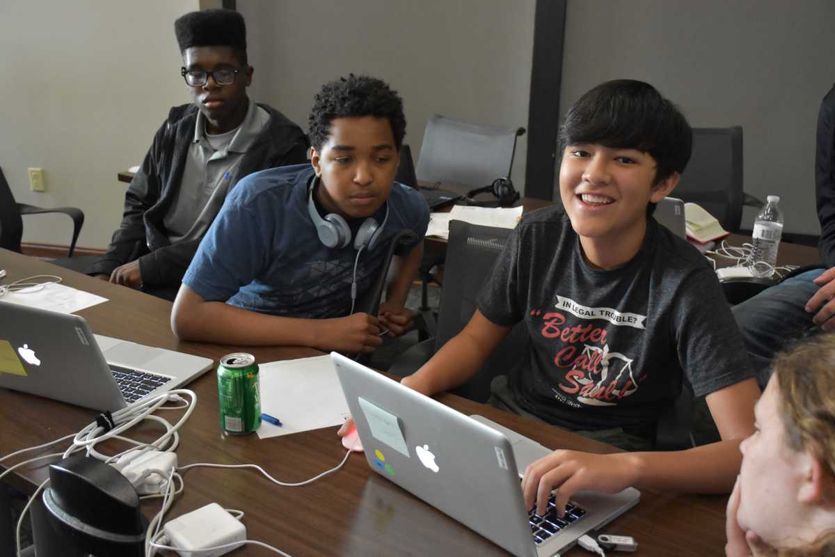 Gamecrash 2016 summer camp participants smiling and having fun makings games